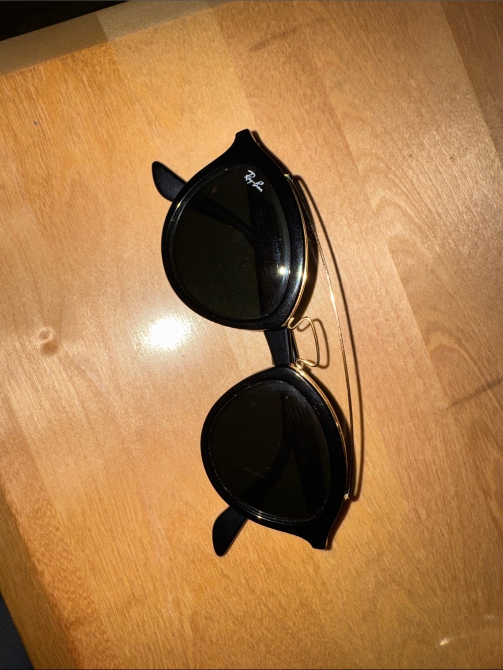 Ray-Ban Black Frames with Gold Bridge and Dark Lenses